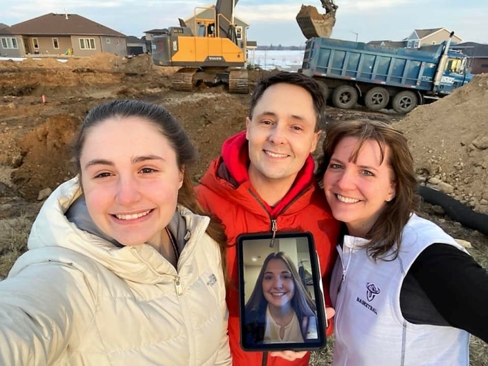 Family photo near construction